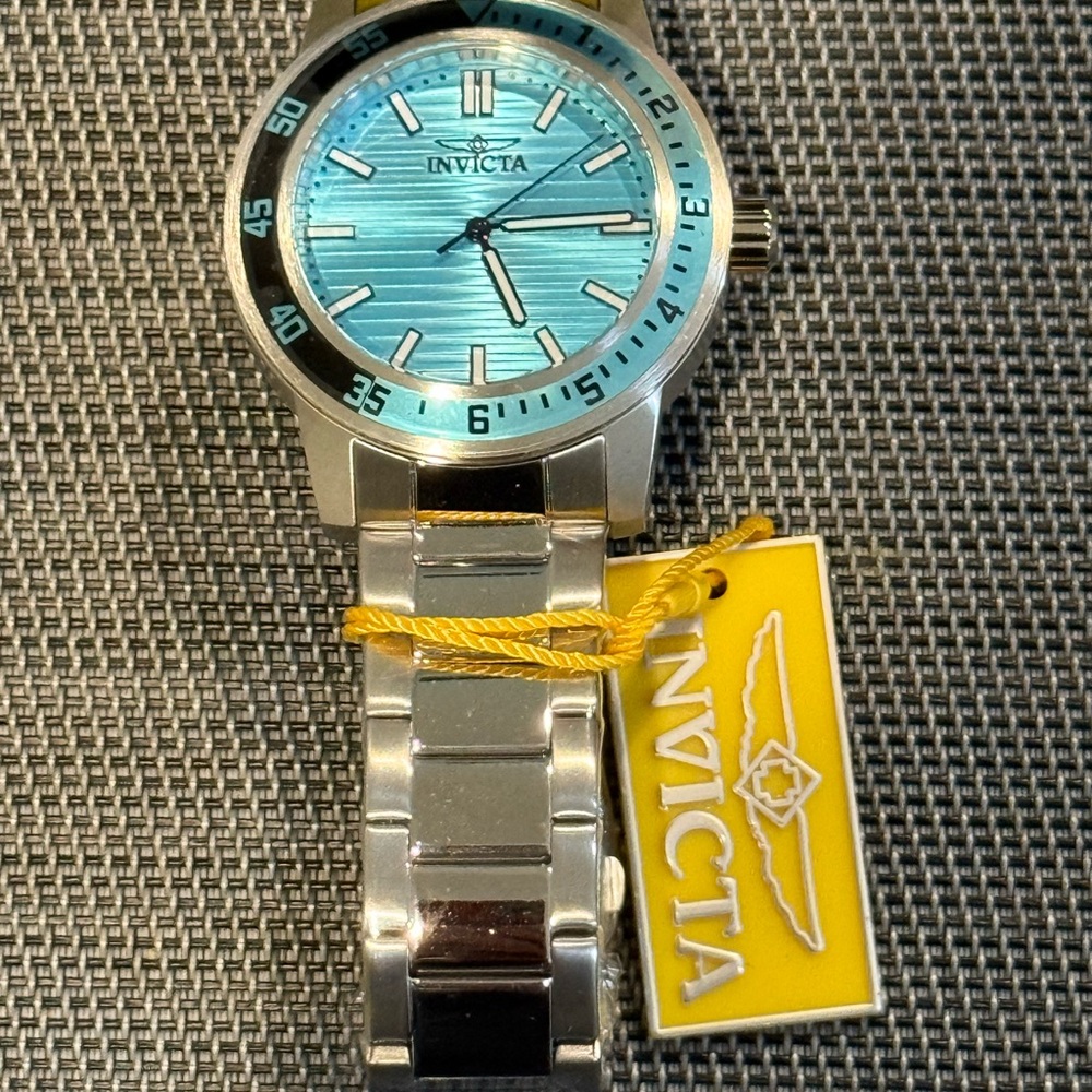 Invicta Aqua and Silver Timepiece